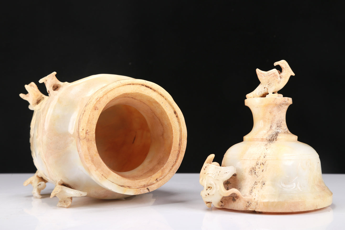 An Archaic White Jade 'Bird' Vase And Cover