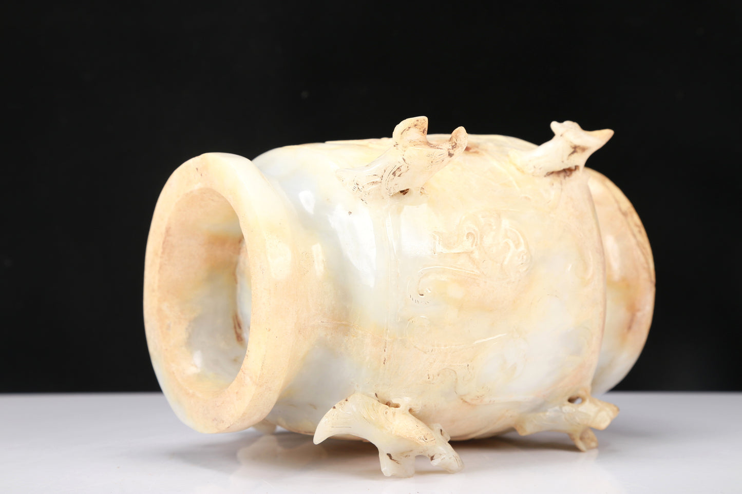 An Archaic White Jade 'Bird' Vase And Cover