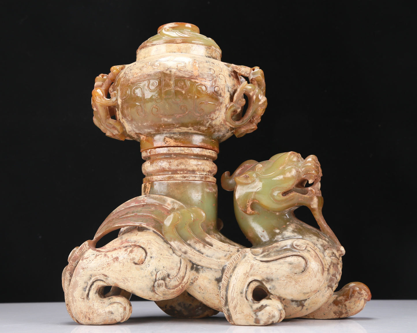 An Archaic Yellow Jade 'Auspicious Beast' Jar