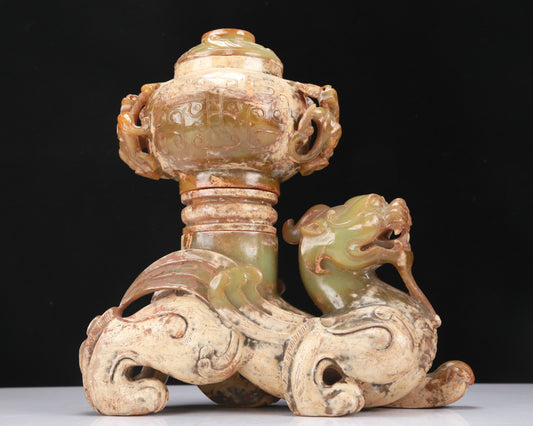 An Archaic Yellow Jade 'Auspicious Beast' Jar