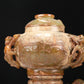 An Archaic Yellow Jade 'Auspicious Beast' Jar