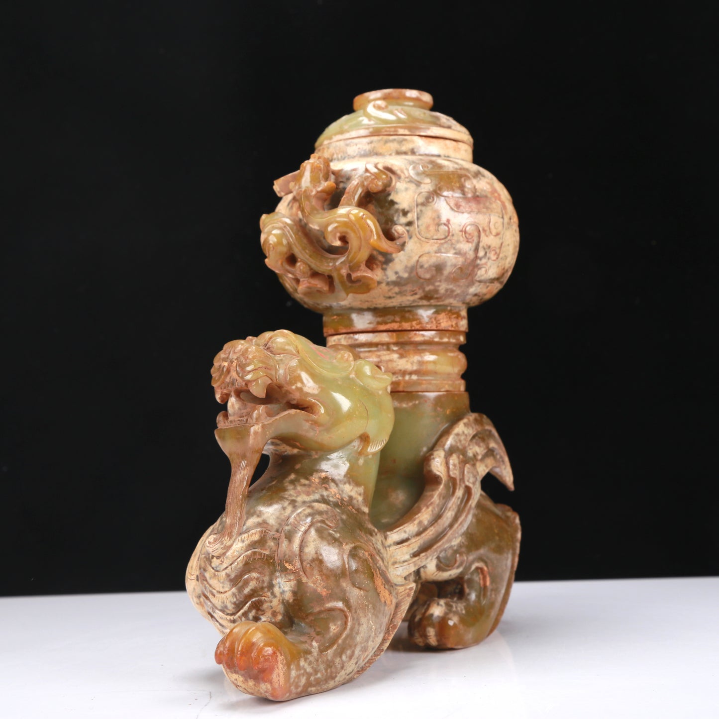 An Archaic Yellow Jade 'Auspicious Beast' Jar