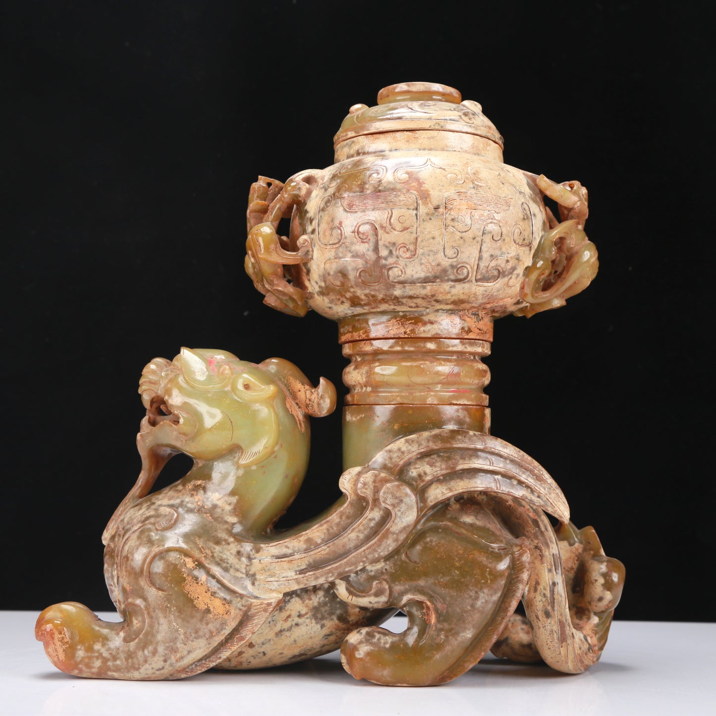 An Archaic Yellow Jade 'Auspicious Beast' Jar