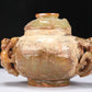 An Archaic Yellow Jade 'Auspicious Beast' Jar