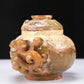 An Archaic Yellow Jade 'Auspicious Beast' Jar