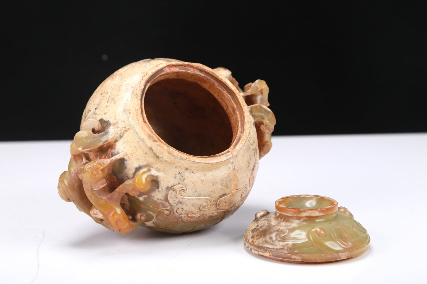 An Archaic Yellow Jade 'Auspicious Beast' Jar