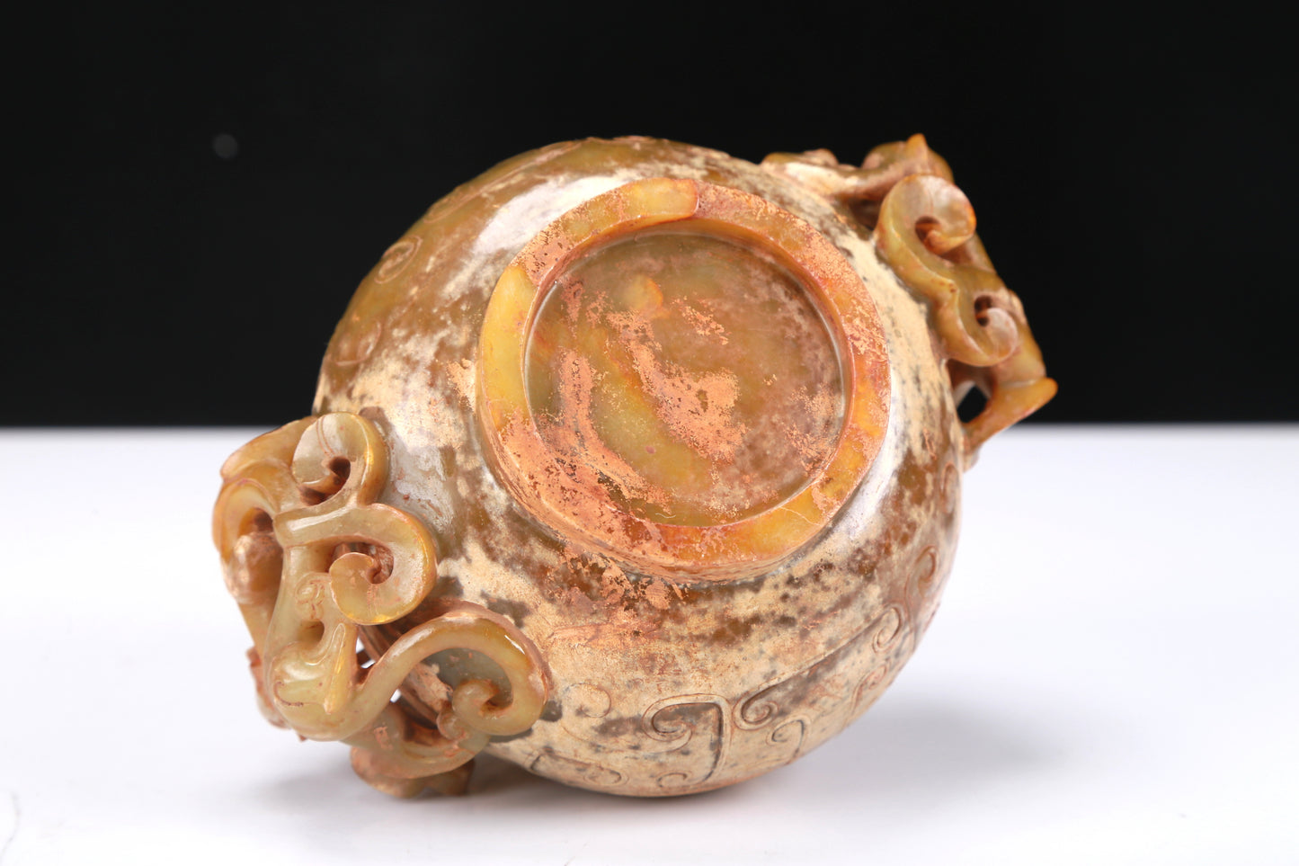 An Archaic Yellow Jade 'Auspicious Beast' Jar