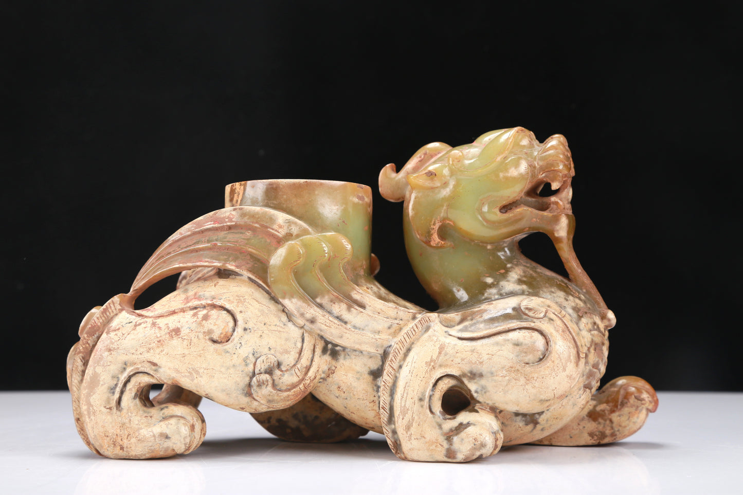 An Archaic Yellow Jade 'Auspicious Beast' Jar