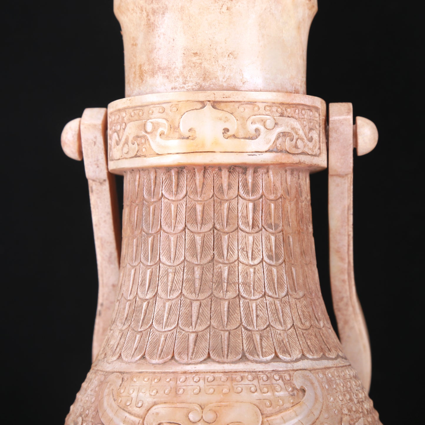 An Archaic White Jade 'Animal Mask' Vase With An Overhead Handle