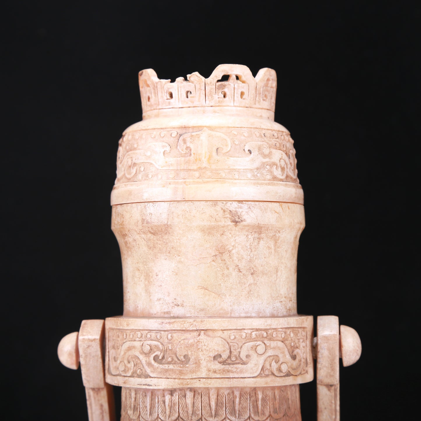 An Archaic White Jade 'Animal Mask' Vase With An Overhead Handle