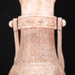 An Archaic White Jade 'Animal Mask' Vase With An Overhead Handle