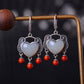 Silver inlaid Hetian jade heart-shaped earrings