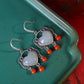 Silver inlaid Hetian jade heart-shaped earrings