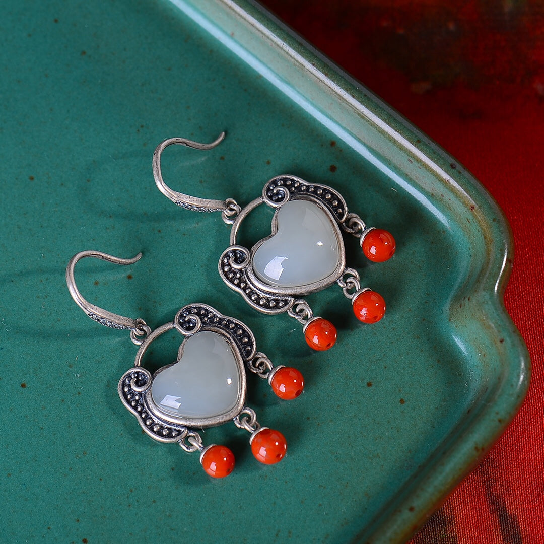 Silver inlaid Hetian jade heart-shaped earrings