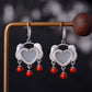 Silver inlaid Hetian jade heart-shaped earrings