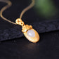 Gilt silver inlaid Hetian jade drop pendant