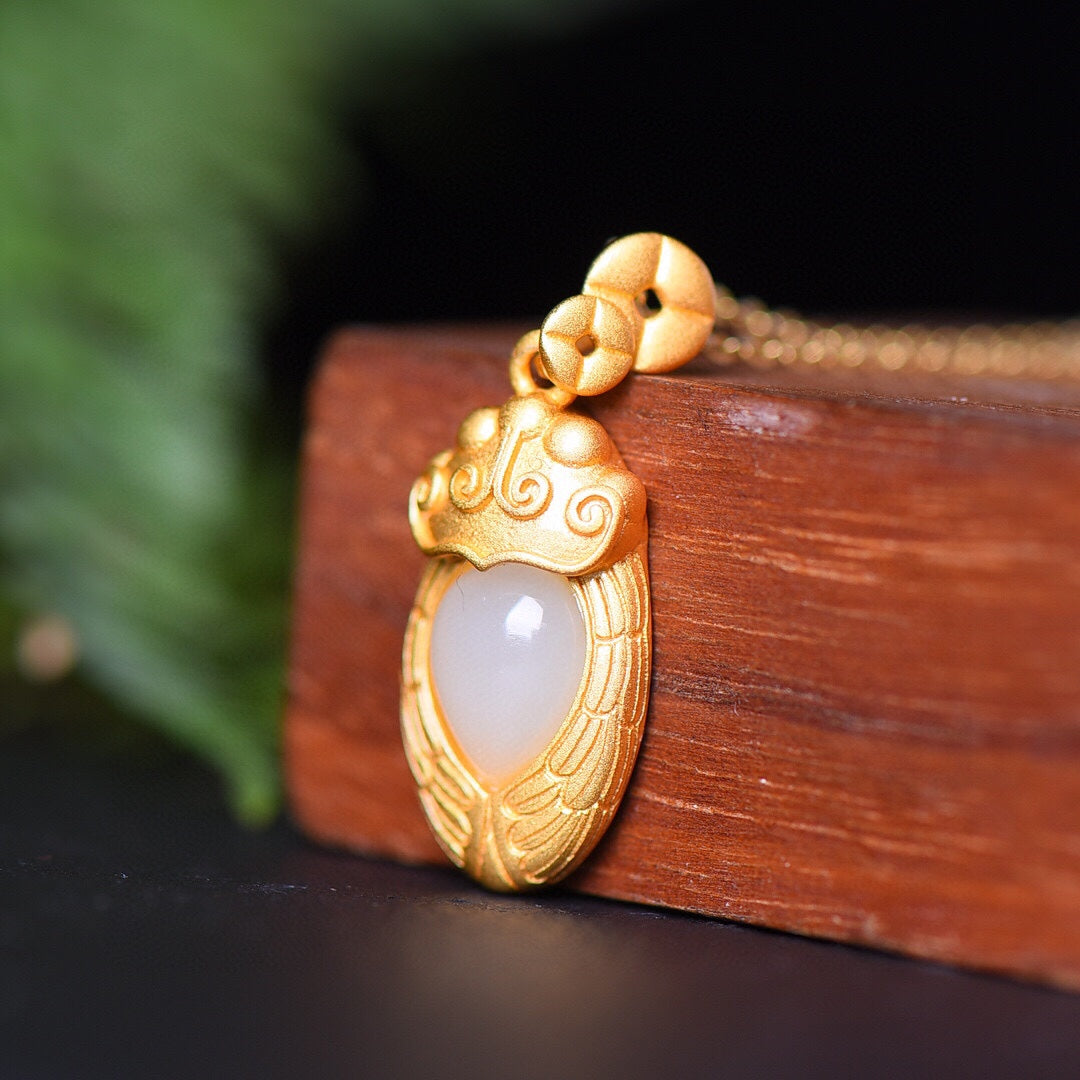 Gilt silver inlaid Hetian jade drop pendant