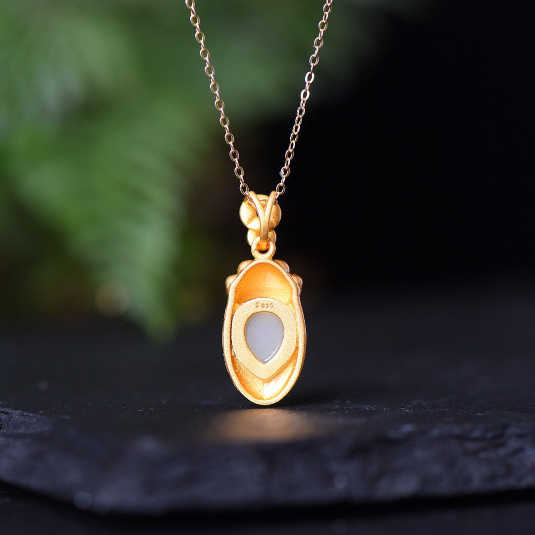 Gilt silver inlaid Hetian jade drop pendant