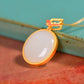 Gilt silver and Hetian jade enamel round egg pendant