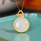 Gilt silver and Hetian jade enamel round egg pendant