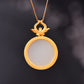 Gilt silver and Hetian jade enamel round egg pendant