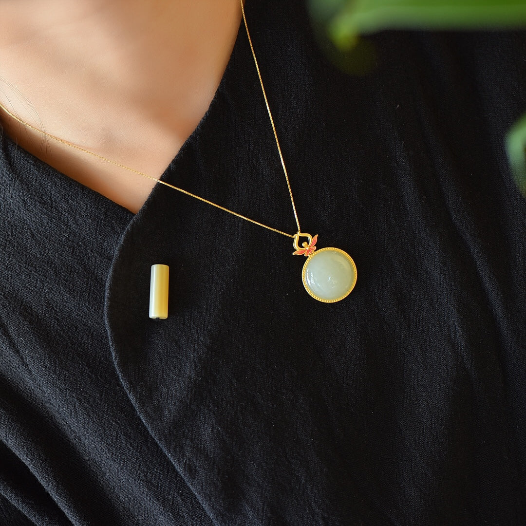 Gilt silver and Hetian jade enamel round egg pendant