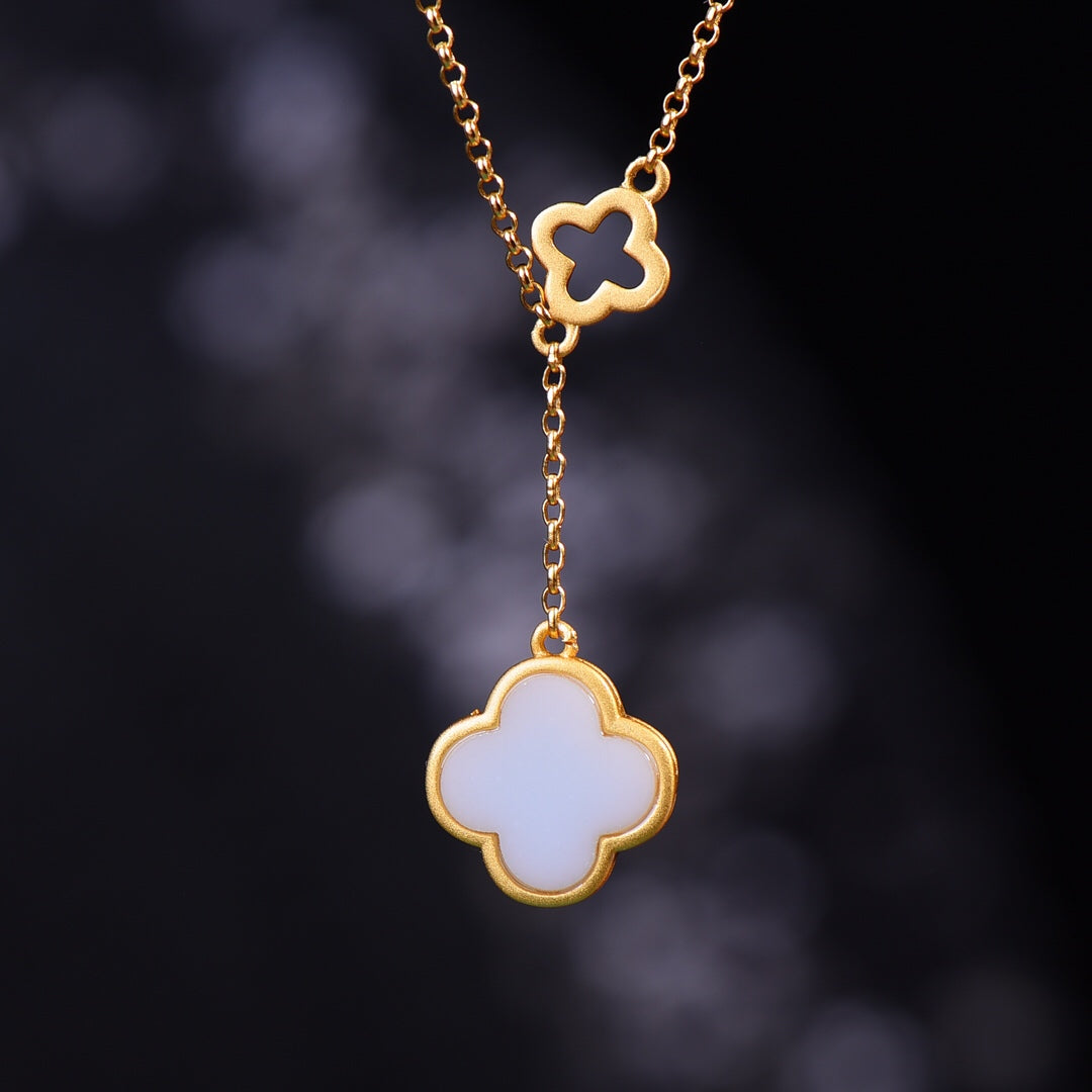 Gilt silver inlaid Hetian jade four-leaf clover pendant