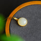 Gilt silver inlaid Hetian jade egg pendant