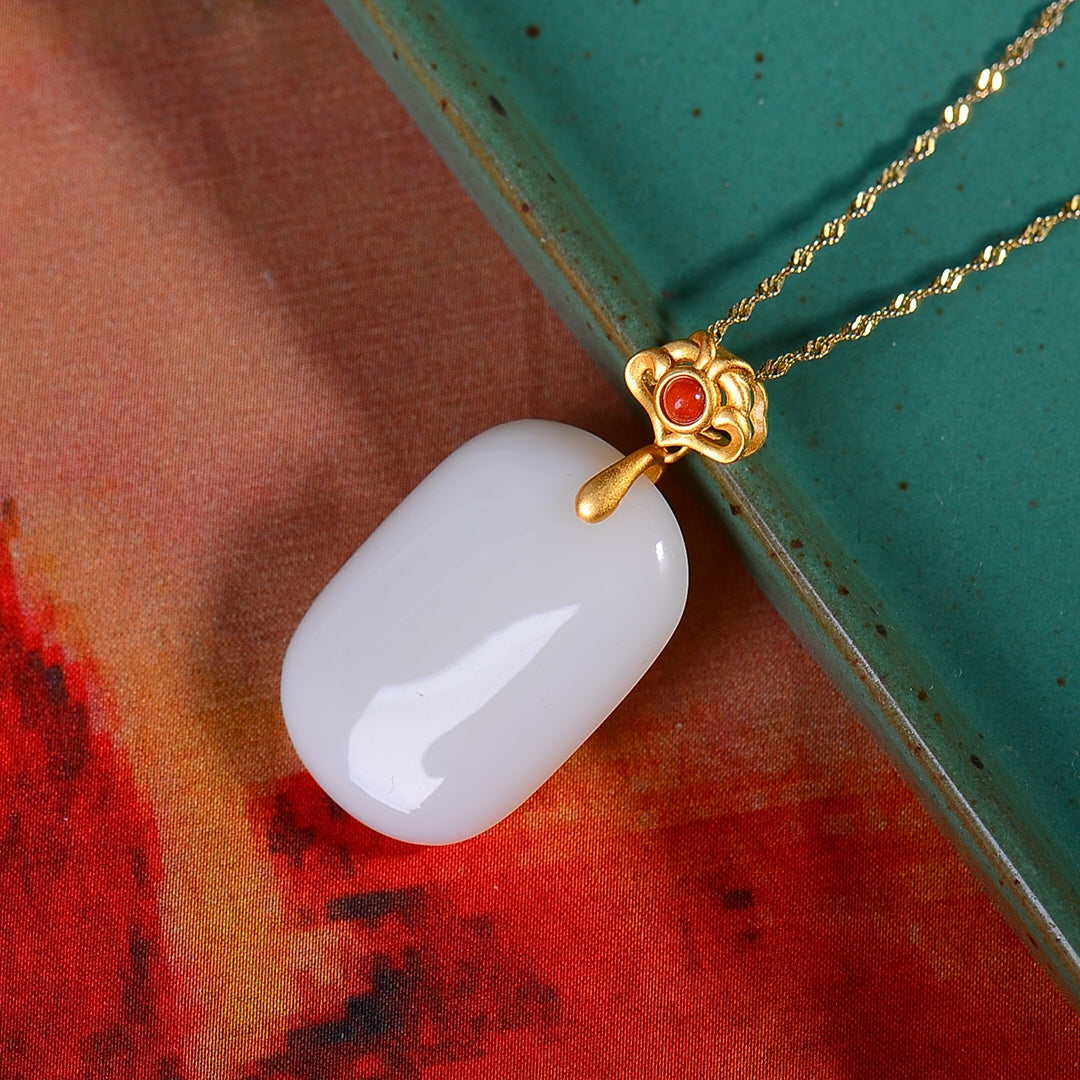 Gilt silver inlaid Hetian jade peace plate with southern red pendant