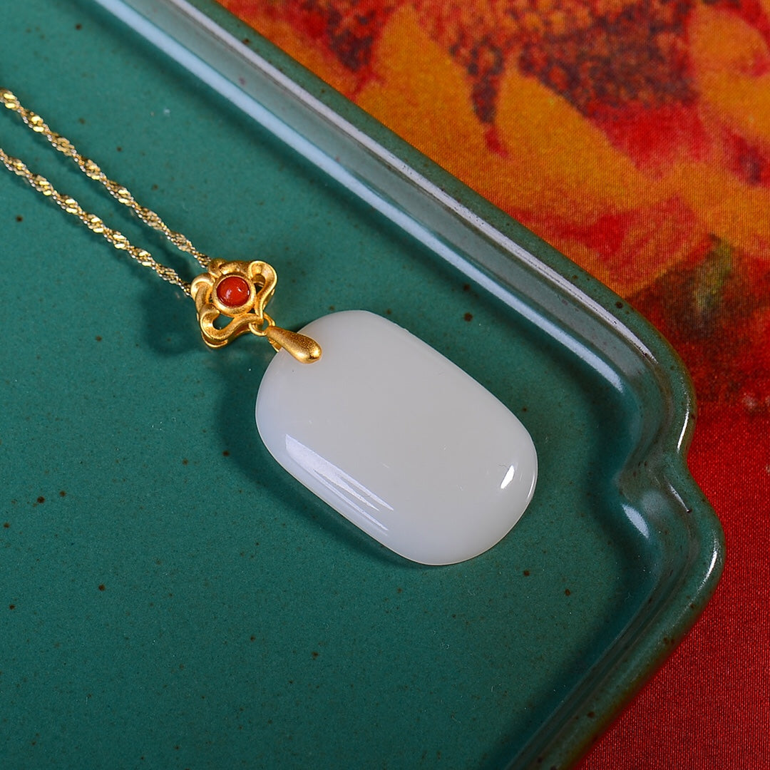 Gilt silver inlaid Hetian jade peace plate with southern red pendant