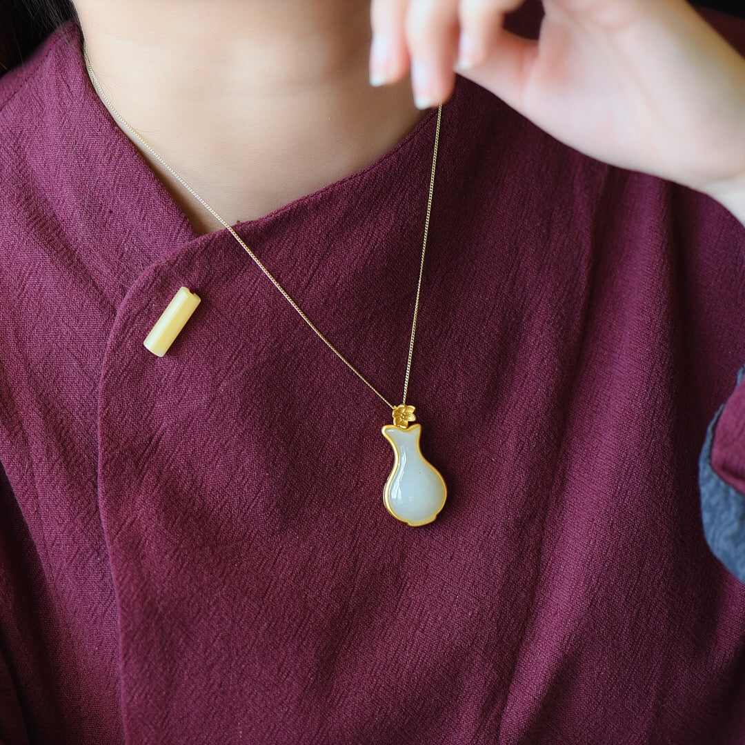 Gilt silver inlaid Hetian jade vase pendant