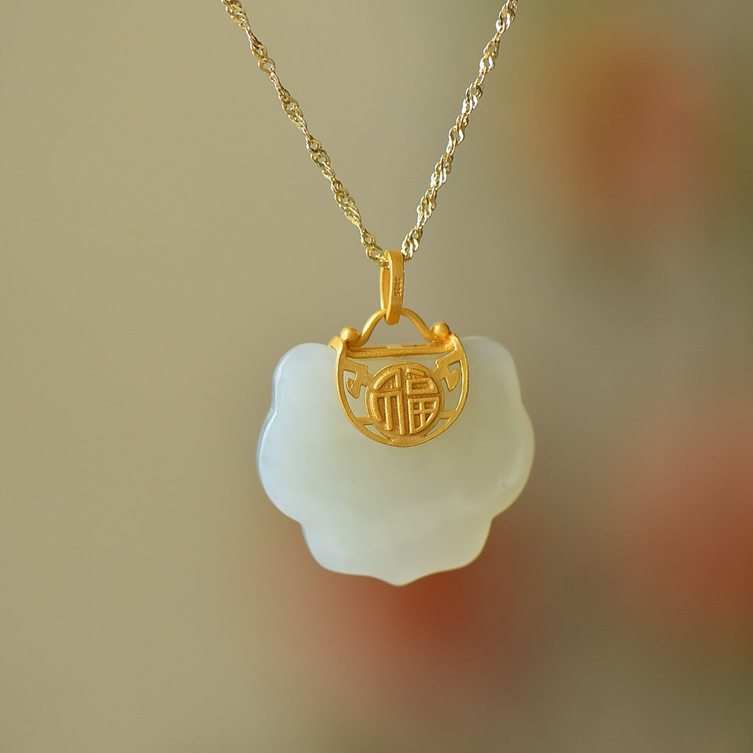 Silver gilt inlaid Hetian jade Ruyi lock pendant with the word "Fu"