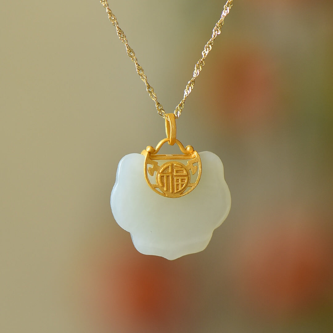 Silver gilt inlaid Hetian jade Ruyi lock pendant with the word "Fu"