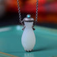 Silver inlaid Hetian jade vase pendant