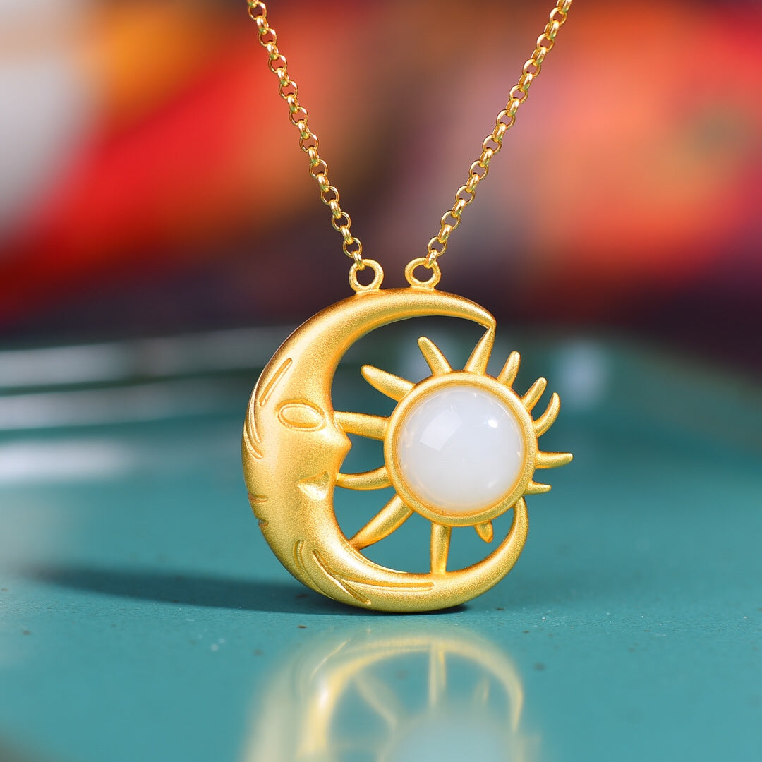 Gilt silver and Hetian jade sun and moon pendant