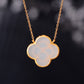 Gilt silver inlaid Hetian jade four-leaf clover pendant