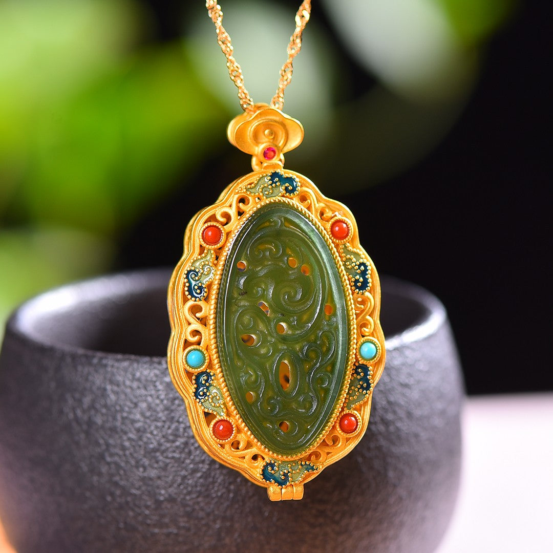 Gilt silver and Hetian jasper hollow sachet pendant