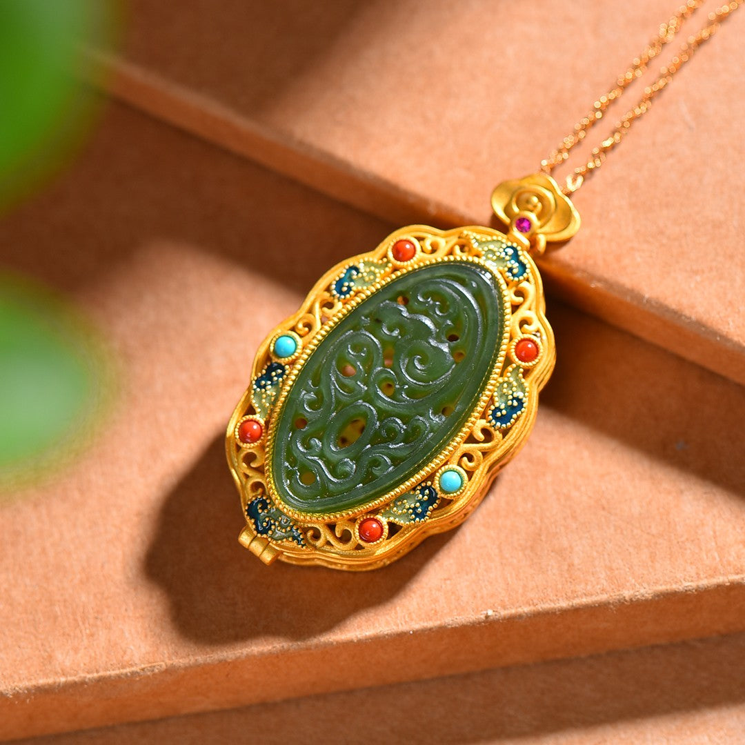 Gilt silver and Hetian jasper hollow sachet pendant