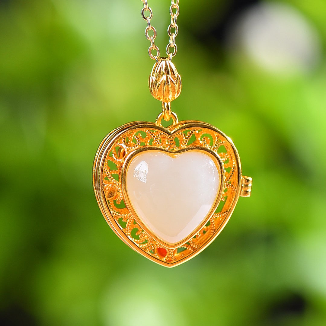 Gilt silver and Hetian jade enamel heart-shaped sachet pendant