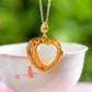 Gilt silver and Hetian jade enamel heart-shaped sachet pendant