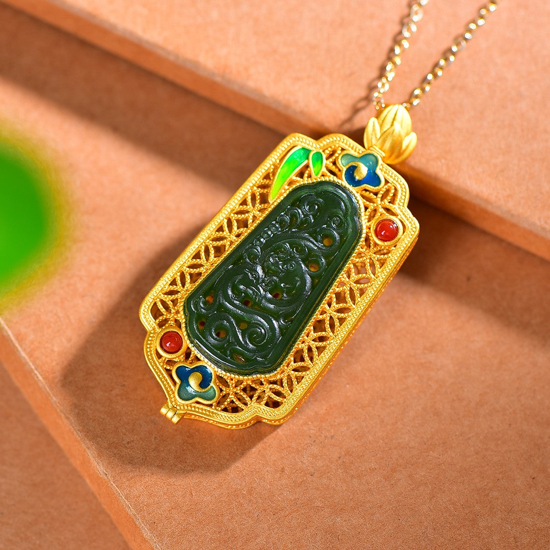 Gilt silver inlaid Hetian jasper hollow sachet pendant