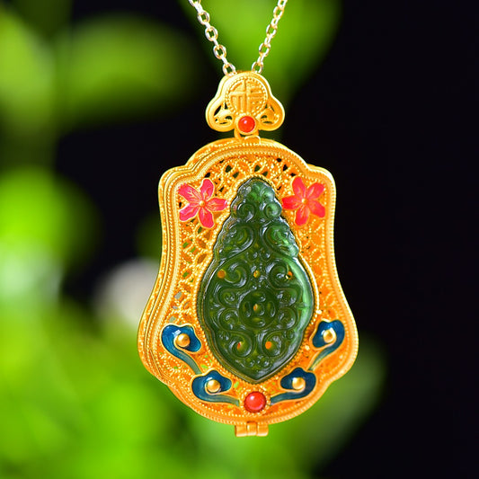 Gilt silver inlaid Hetian jasper hollow sachet pendant