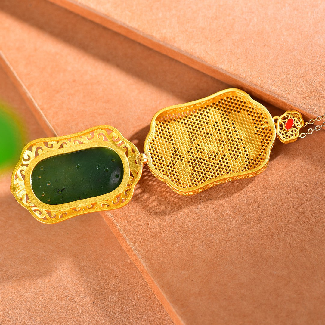 Gilt silver inlaid Hetian jasper hollow sachet pendant