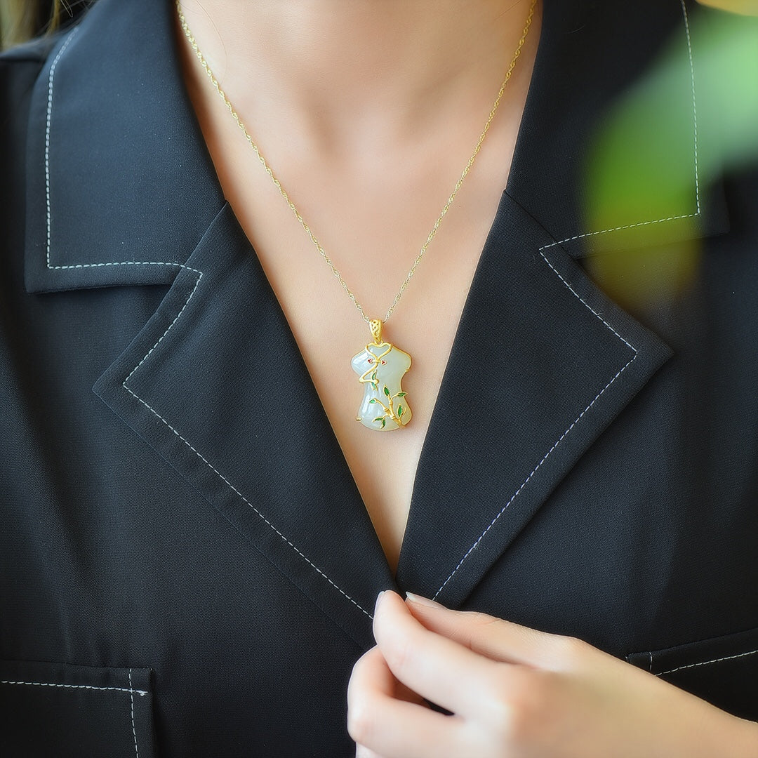 Gilt silver cheongsam pendant inlaid with Hetian jade