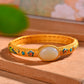 Silver gilt and Hetian jade enamel egg bracelet