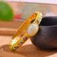 Silver gilt and Hetian jade enamel egg bracelet