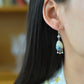 Silver inlaid Hetian jade drop enamel with multi-treasure earrings