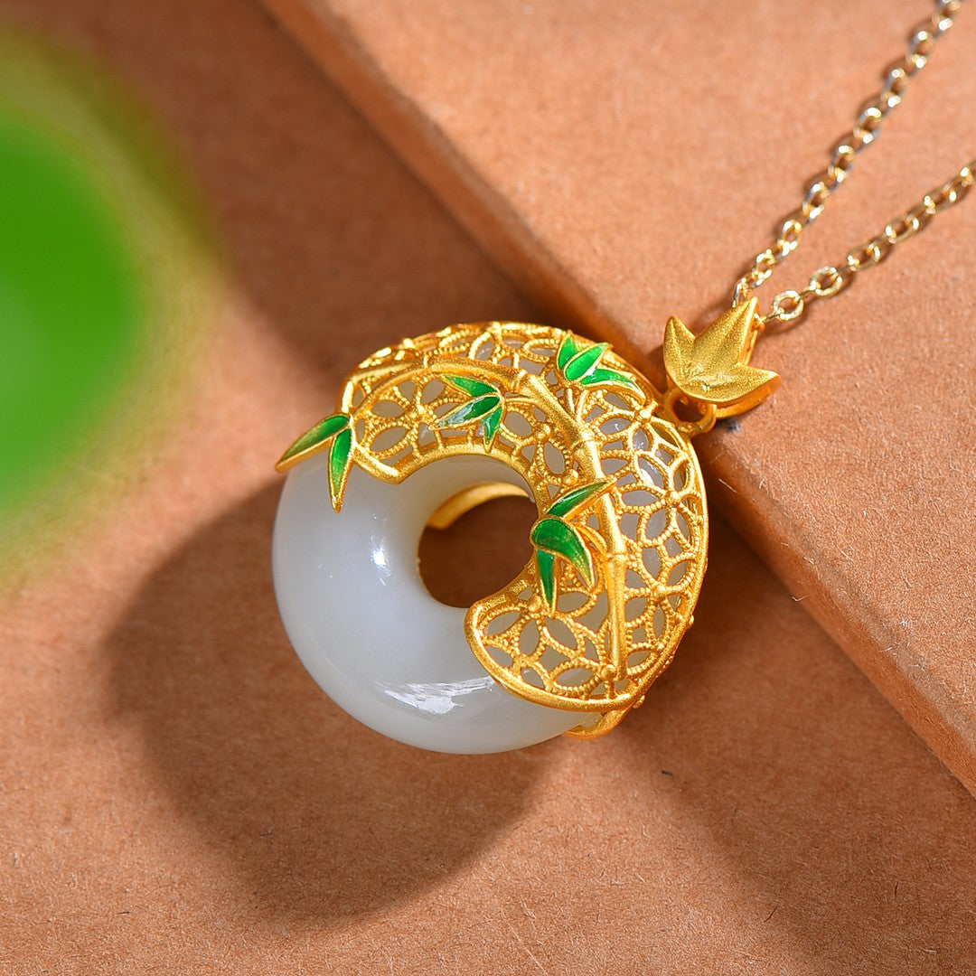 Gilt silver and Hetian jade enamel peace ring pendant