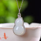 Silver inlaid Hetian jade gourd pendant