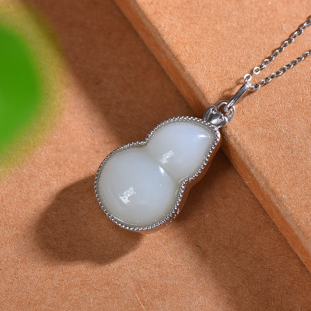 Silver inlaid Hetian jade gourd pendant